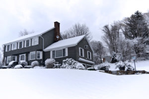 house in winter depicting home heating