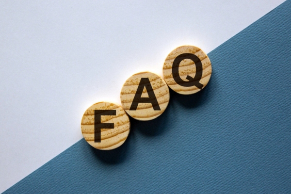 FAQ spelled using circular wooden letter chips depicting Furnace Troubleshooting questions