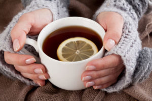 drinking hot tea to stay warm during a heater failure