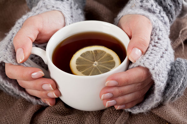 drinking hot tea to stay warm during a heater failure