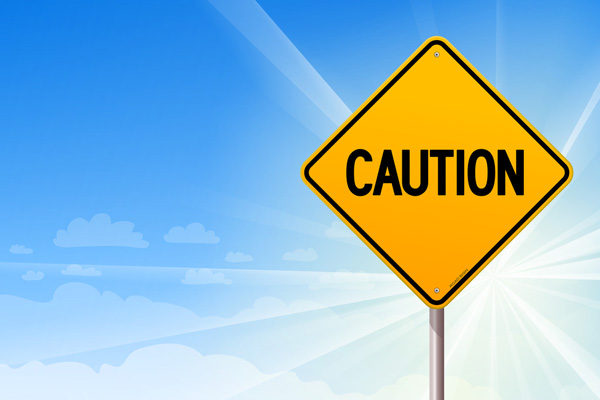 image of caution sign depicting dangers of coolant leak of AC unit