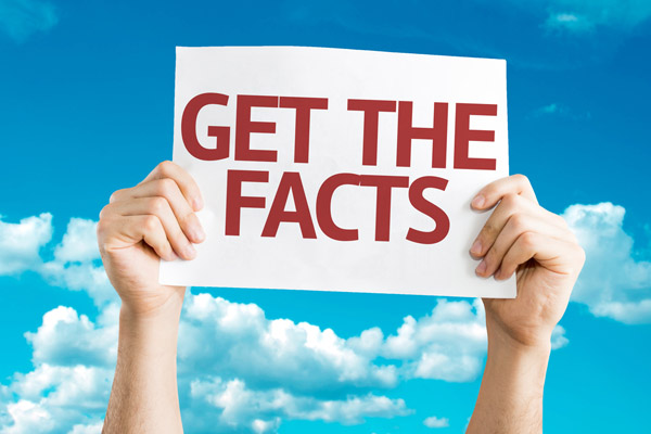 image of a person holding a fact sign depicting air conditioner facts