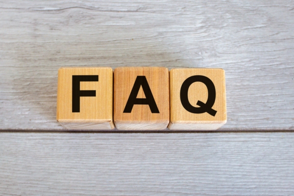 FAQ spelled using wooden letter cubes depicting Questions About HVAC Technology