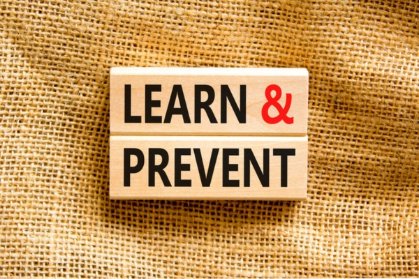 LEARN & PREVENT written on wooden bars depicting Future Air Conditioner Freeze-Ups