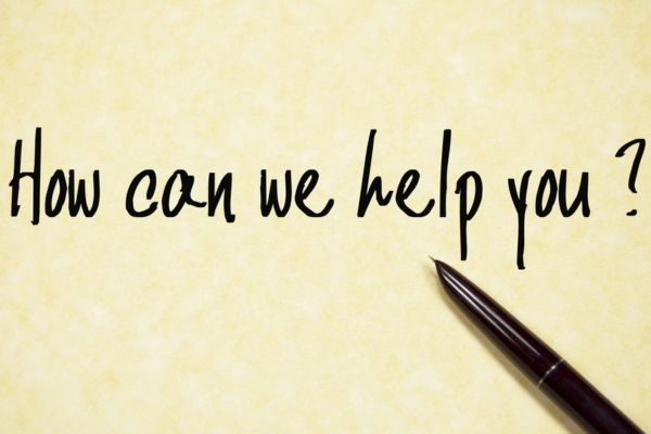 how can we help you text on paper