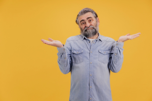 man with both hands on the side asking When It Is Time to Replace Your Home Heating Oil Tank
