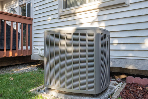 image of an AC compressor unit that is making a banging noise