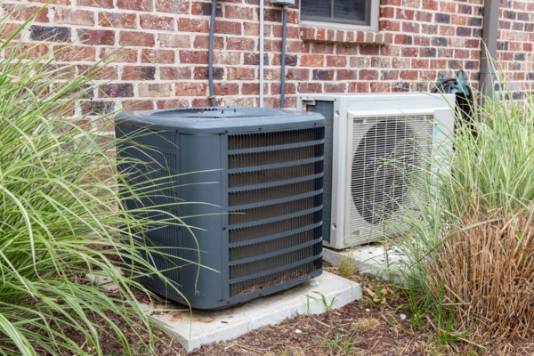 Air Conditioner Condenser blocked by grass