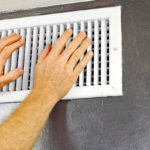 image of an air conditioner air vent depicting ac outdoor unit that is working but not cooling