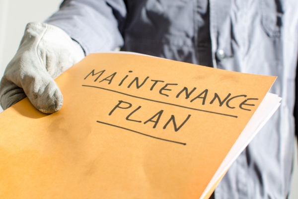 folder labeled with maintenance plan depicting standby generator