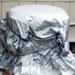 air conditioner covered with silver cover
