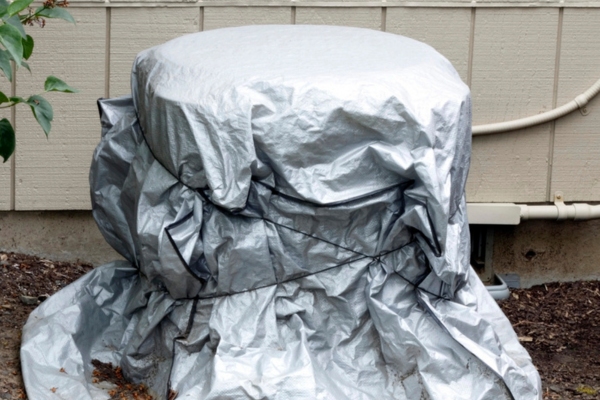 air conditioner covered with silver cover