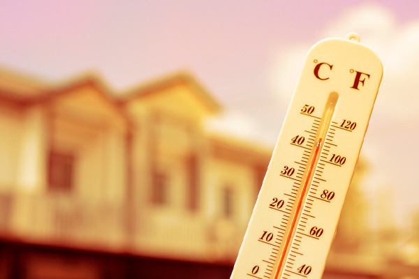 thermometer depicting high summer temperatures and broken heat pump