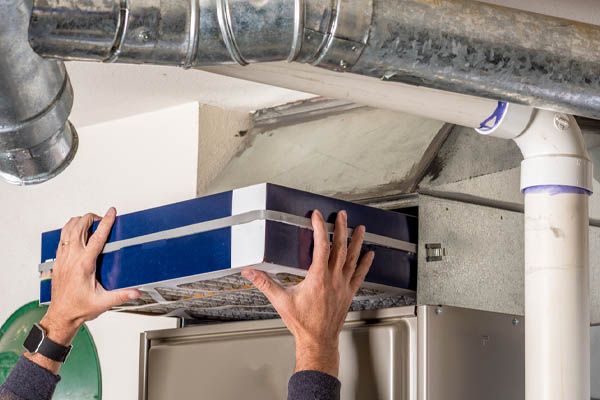 image of a furnace filter replacement