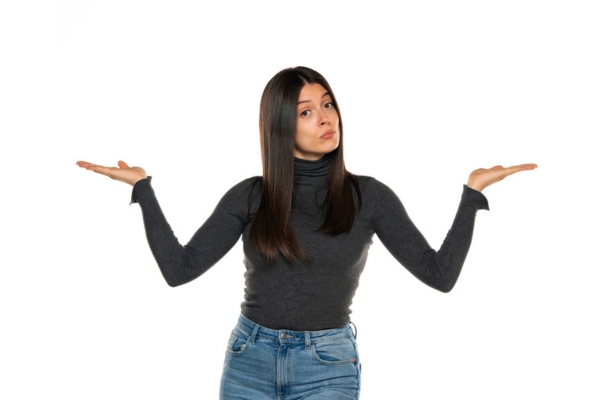 woman shrugging depicting How Proper Furnace Size Is Determined