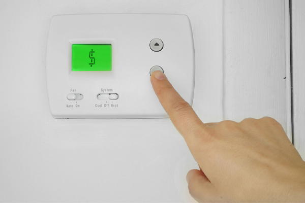 image of a thermostat depicting thermostat and energy savings