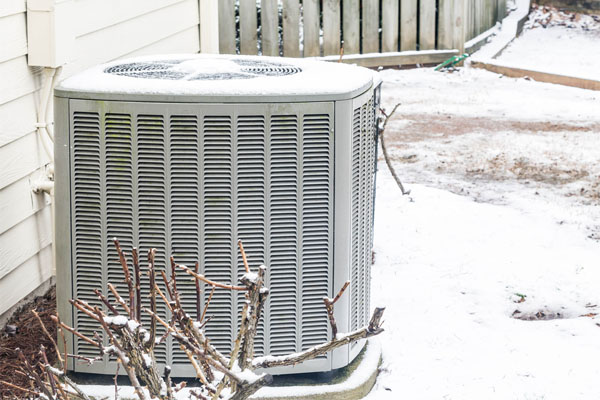 air conditioner unit in the snow 