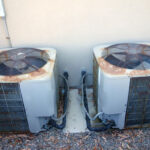 rusty old air conditioner condenser unit