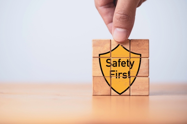 safety first icon assembled using wooden puzzle depicting standby generators