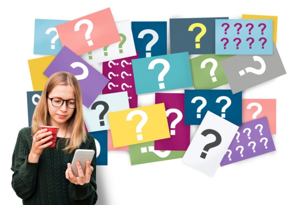woman looking at phone while drinking coffee in front of a collage of question marks depicting FAQs about Why Is My AC Not Keeping Up