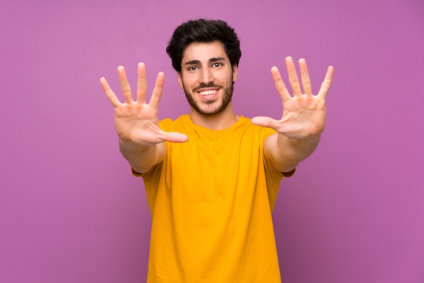 Man holding 10 fingers up depicting Reasons to Get a Home Generator