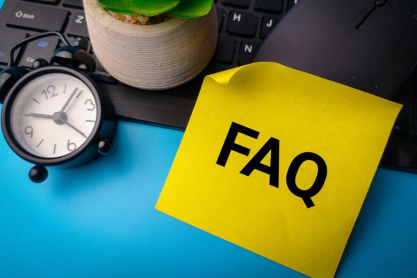 Sticky note with the word FAQ depicting frequently asked questions about Whole-House Generators
