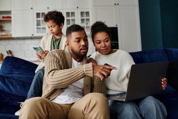 couple researching online depicting Selecting the Best Boiler