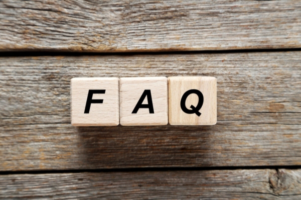 FAQ spelled using wooden letter cubes depicting Water in Oil Tank questions