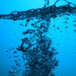 splash of water with bubbles depicting water in oil tank