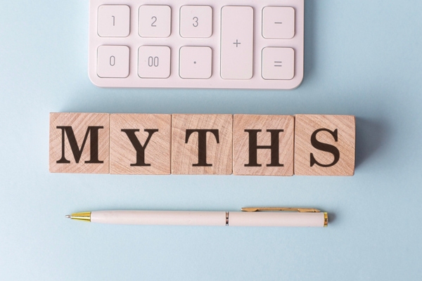 MYTHS spelled using wooden letter cubes