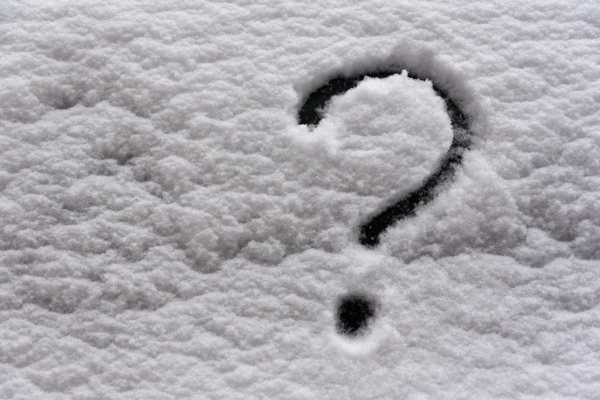 question mark drawn on snow depicting Home Heating Oil Deliveries FAQs