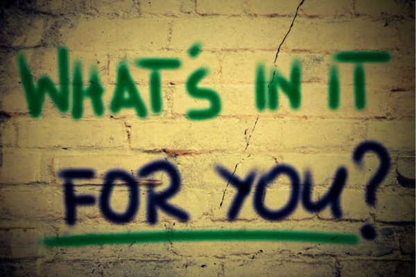 what's in it for you phrase spray painted on a wall depicting Advantages of Maintaining Proper Boiler Water Quality