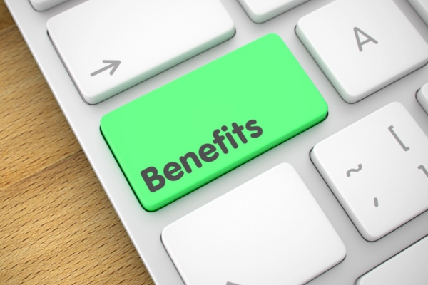 BENEFITS written on a green keyboard button depicting Topping Off Your Oil Tank Early