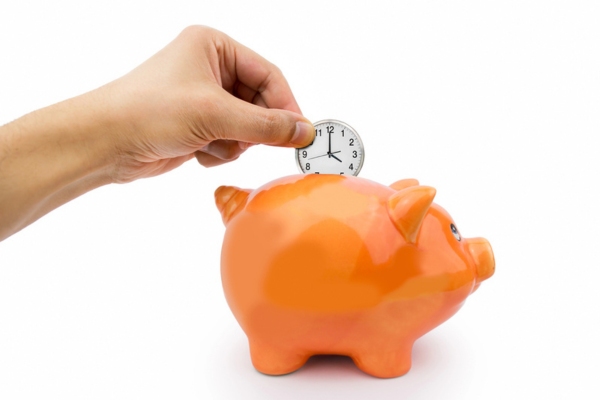 man putting pocket watch in a piggy bank depicting saving time and money