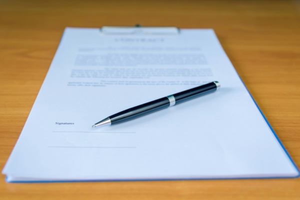 service contract on a clipboard