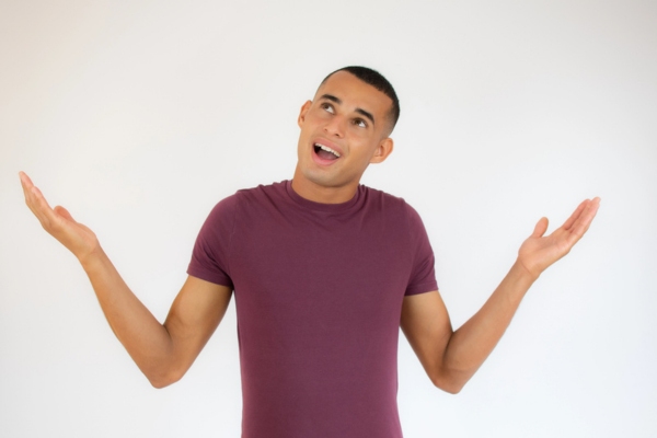 man looking up while shrugging depicting How to Know When Your Air Conditioner Should Be Replaced