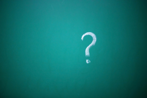 question mark written on a chalkboard depicting Heating Oil Tank Corrosion FAQs