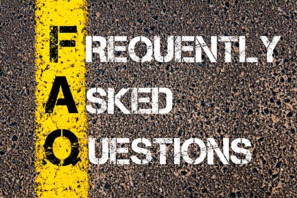 Frequently Asked Questions spray painted on concrete depicting Air Conditioning Health Effects FAQs