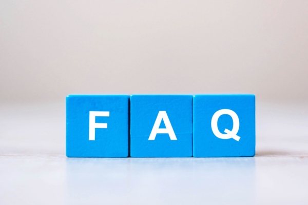 FAQ spelled using blue wooden letter cubes depicting Emergency Air Conditioner Repair questions