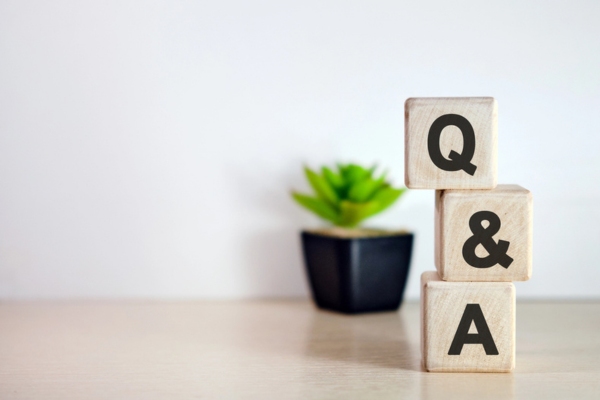Q and A on wooden letters stacked on top of each other depicting Summer Heating Oil Tank questions