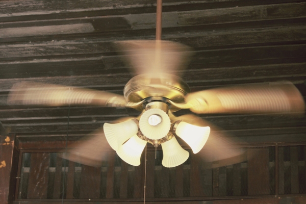 running ceiling fan at home depicting Temporary Cooling Solutions During an AC Emergency