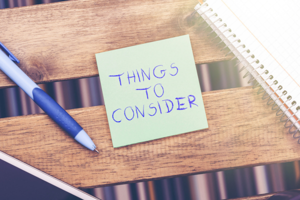 things to consider written on a sticky note depicting HVAC Warranty Factors