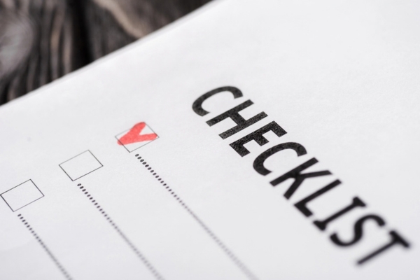 Close up of checklist with red tick depicting Key Factors When Selecting a Local Heating Oil Supplier
