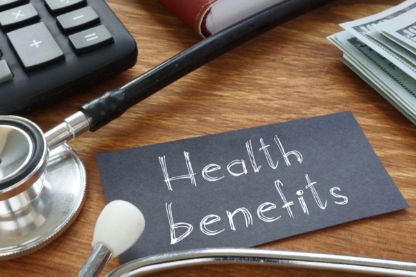 health benefits written on a black paper using silver ink depicting air conditioner