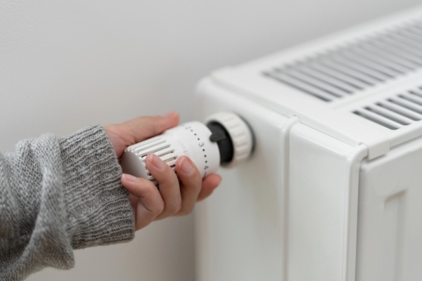 adjusting home heating radiator